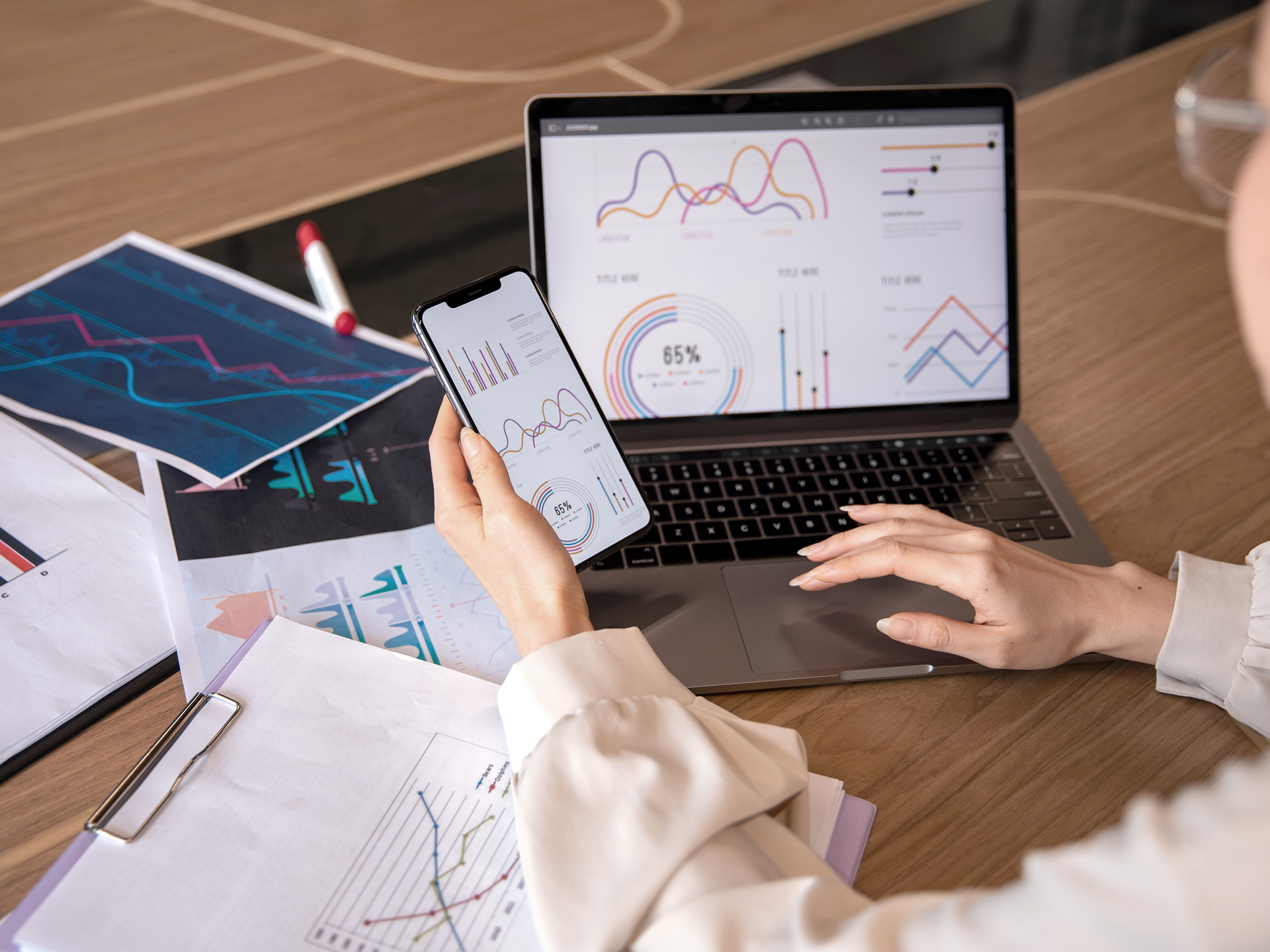 woman-working-with-statistics-on-a-laptop